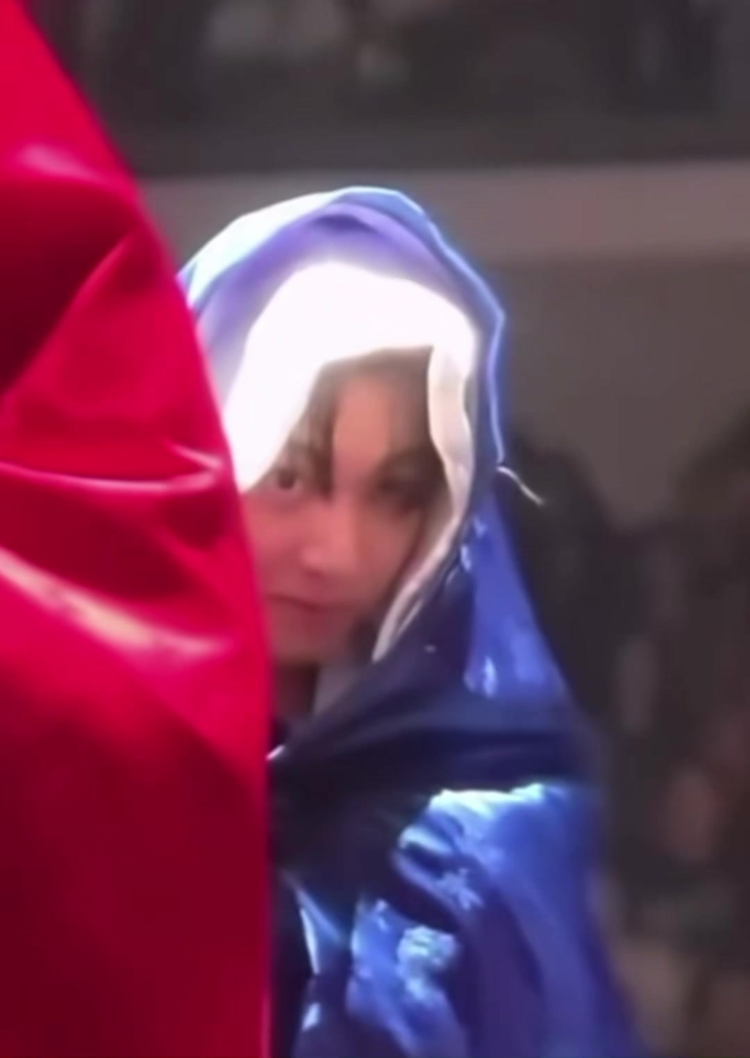 Jungkook peeking in blue robe