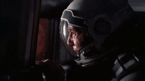 astronaut looking out window