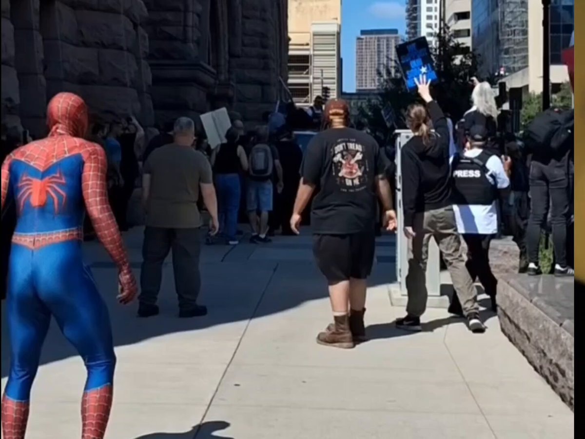 Spider-Man punches Jake Lang Minneapolis