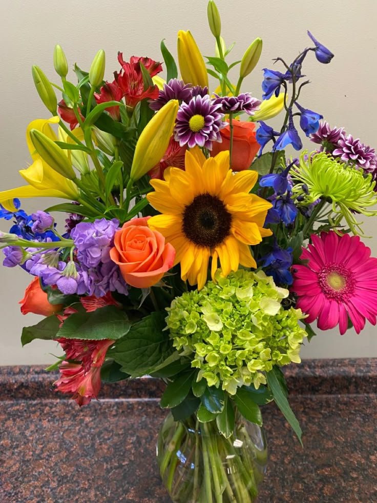 Colorful mixed bouquet with sunflower Colorful mixed bouquet with sunflower