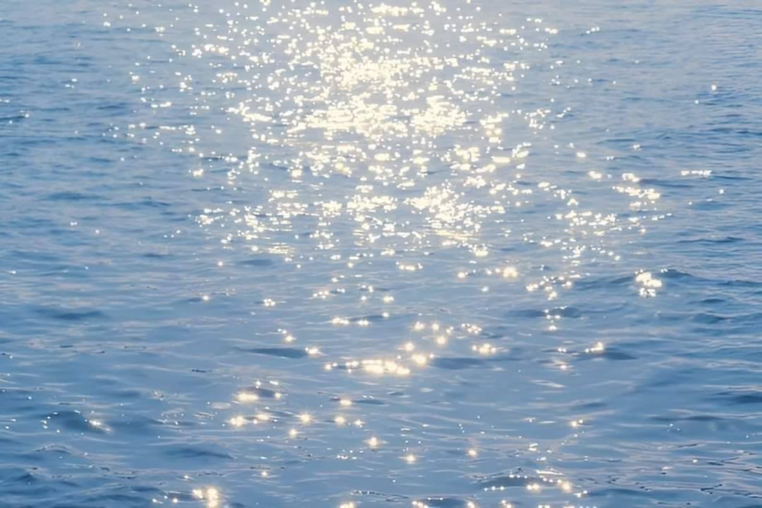 ocean glitter sunlight (photo 3 of 4)