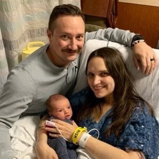 Newborn first hold after coma (photo 2 of 2)