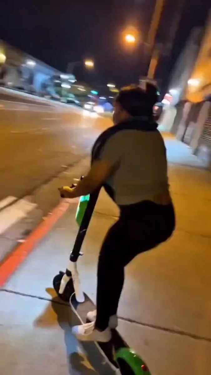 Scooter rider night