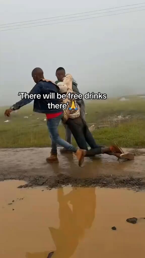 two young men on muddy road