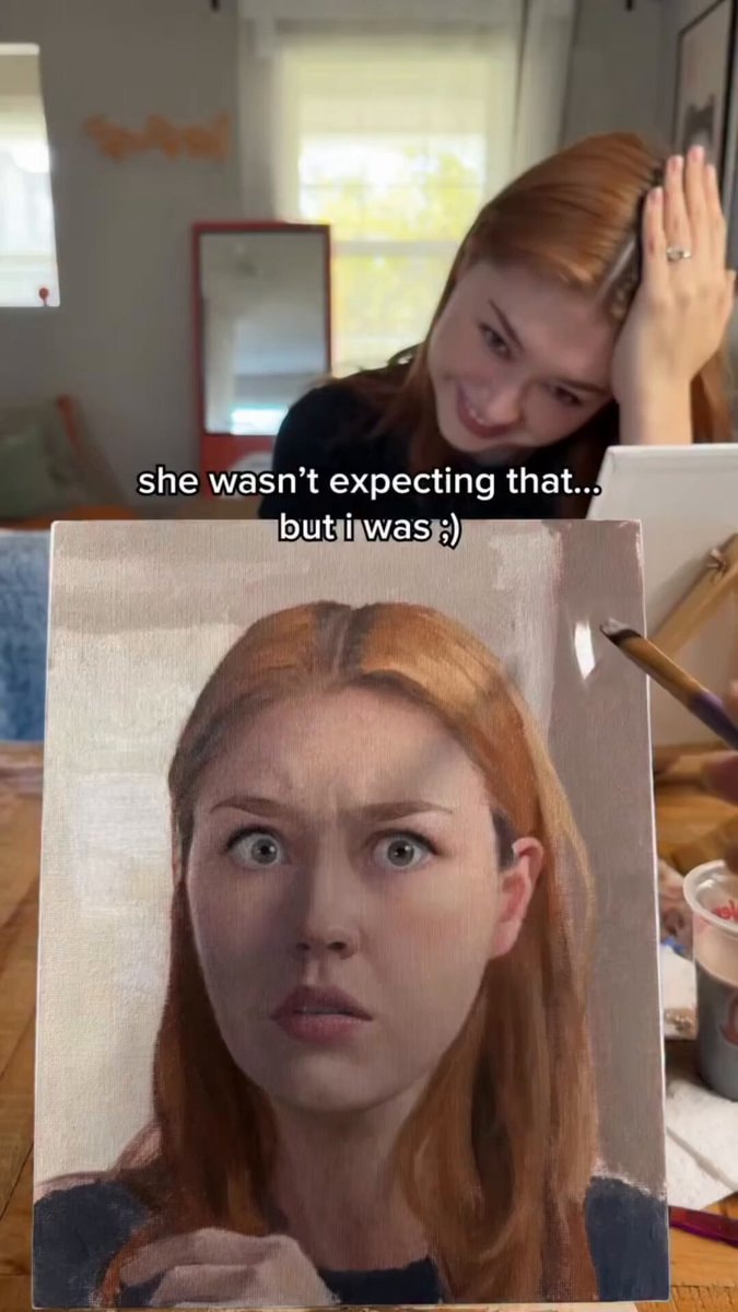painting of woman with surprised eyes