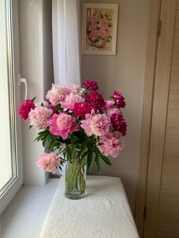 pink peonies in a glass vase (photo 3 of 4)