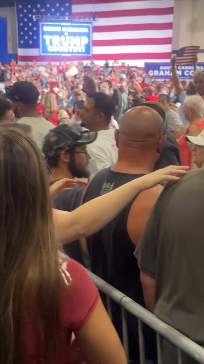 Leftist woman removed from Trump rally