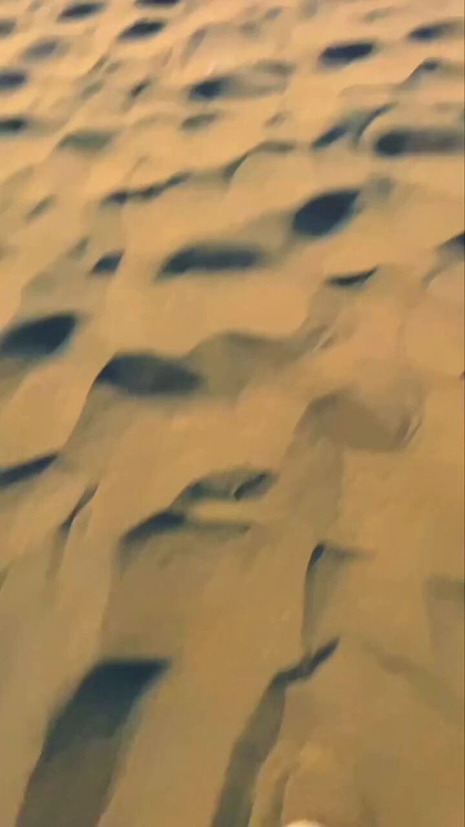 Serene desert dunes view