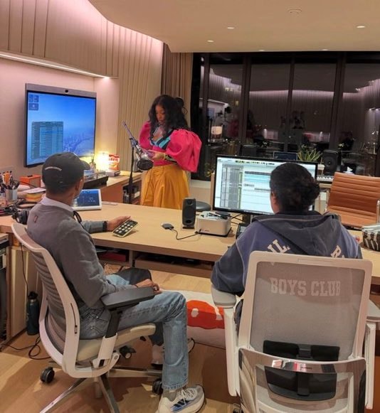 SZA and Pharrell Williams in the studio
