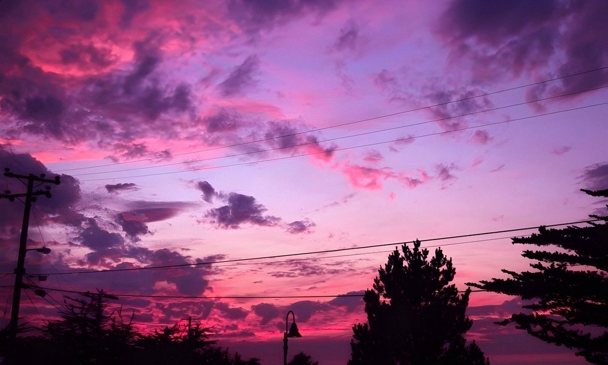 Pink sunset over mountains (photo 3 of 4)