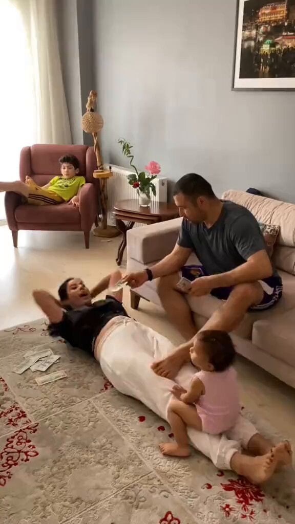 Family moment with money and sit-ups