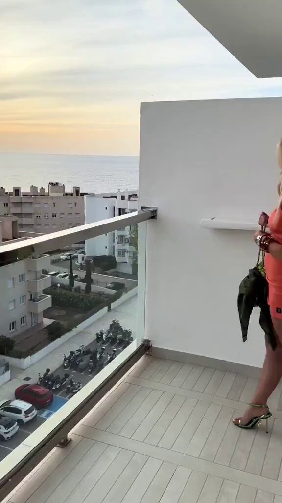 Lucy Fallon on balcony