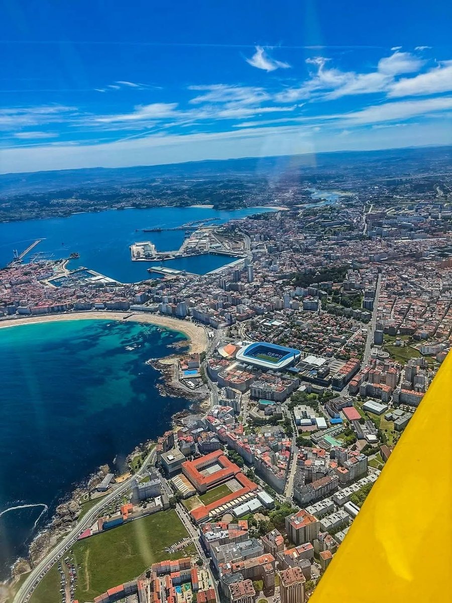 Coastal city aerial from plane