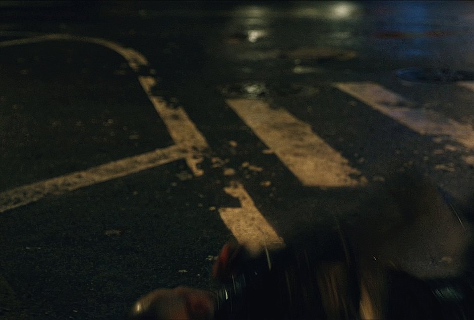 wet crosswalk at night