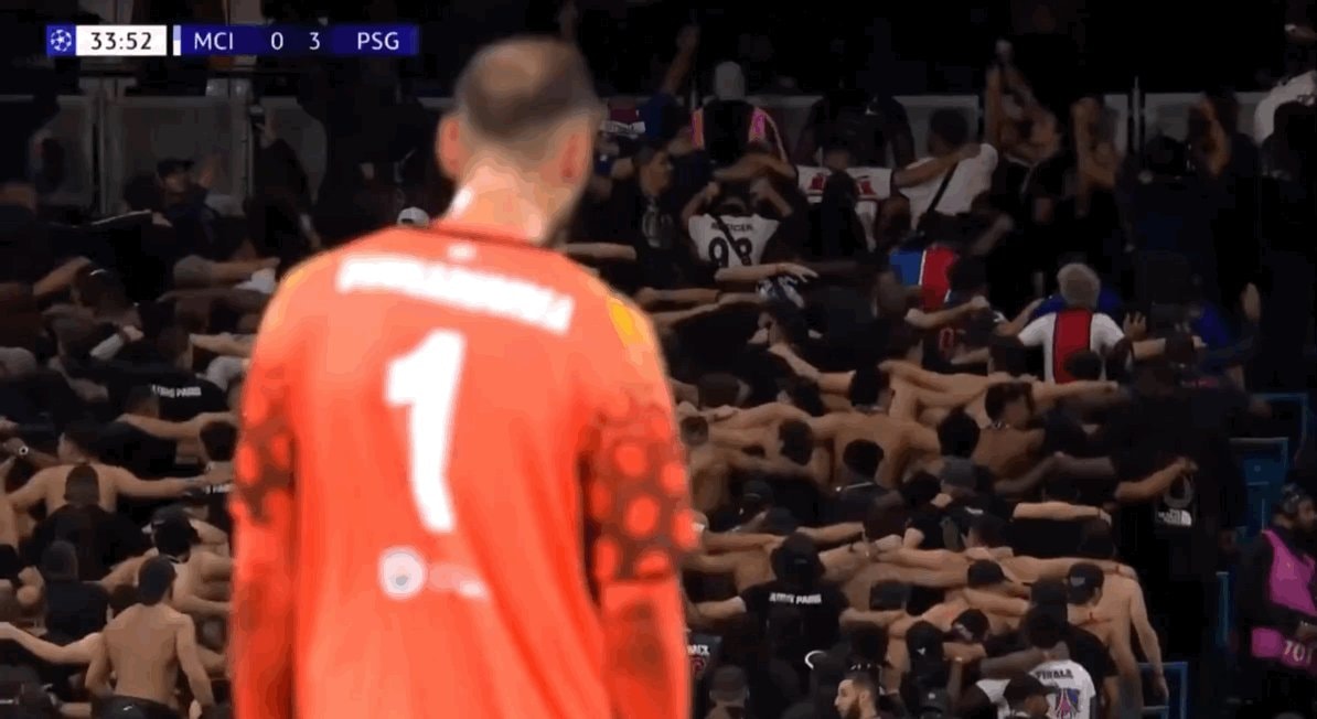 goalkeeper in orange jersey reaction