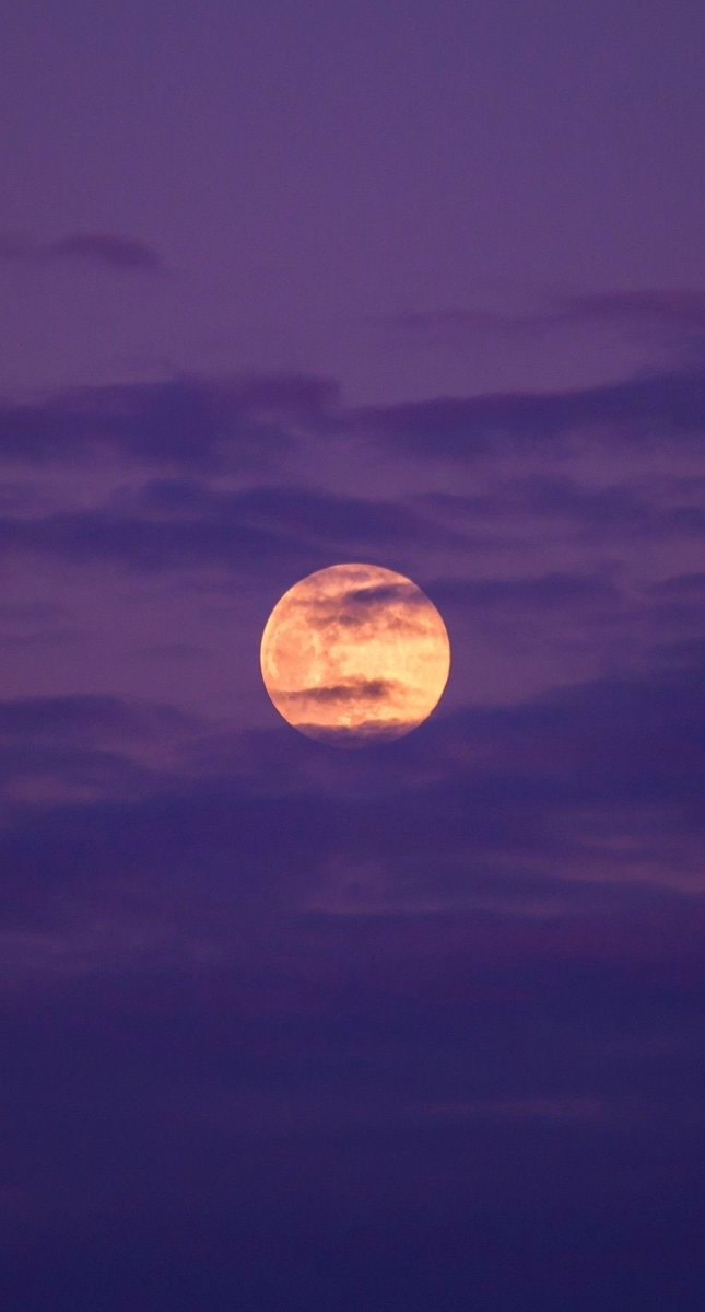 Full moon orange clouds