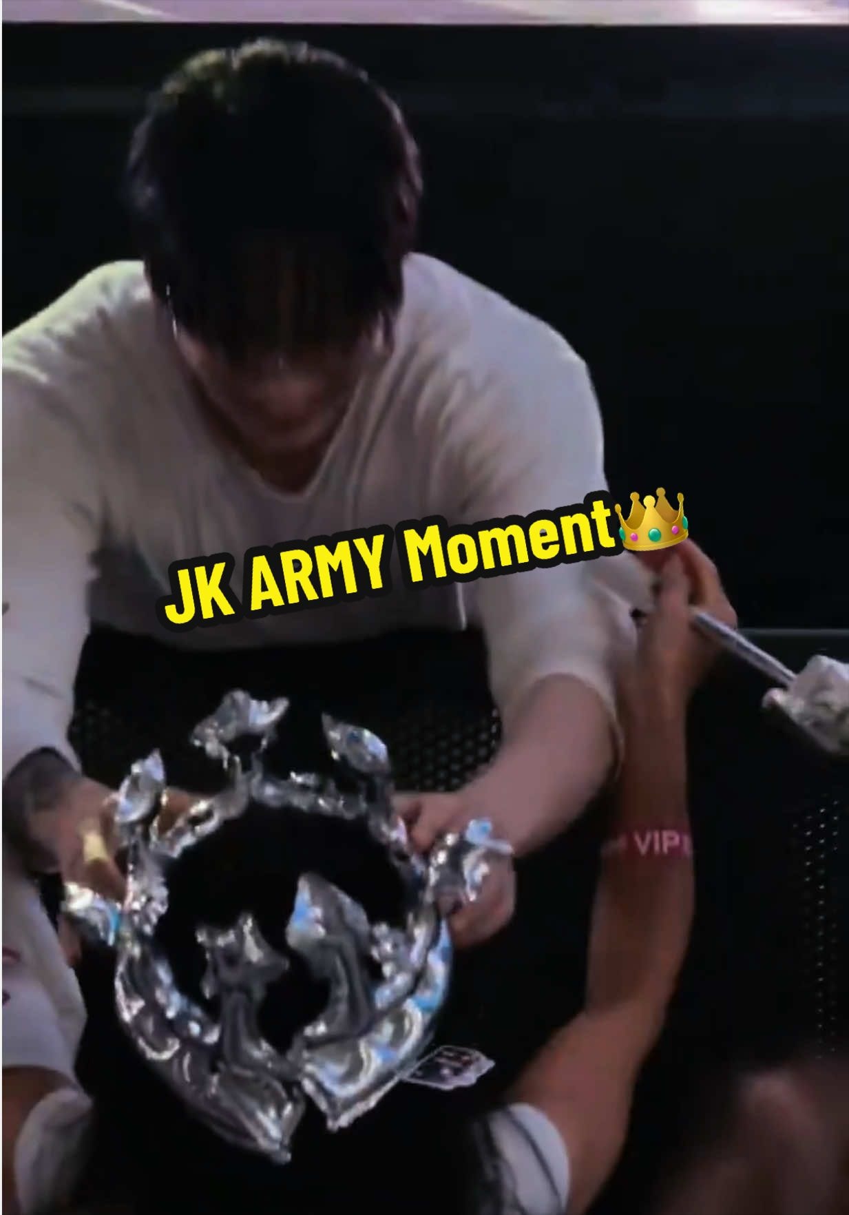 Jungkook gives shirt and crown to disabled fan