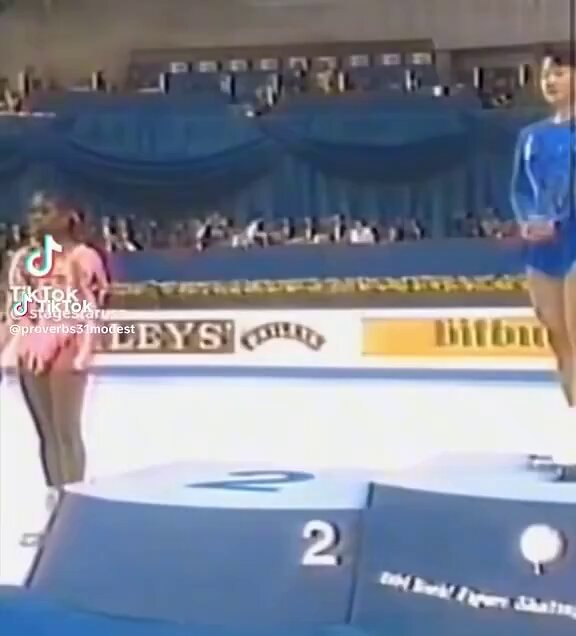 figure skaters on podium