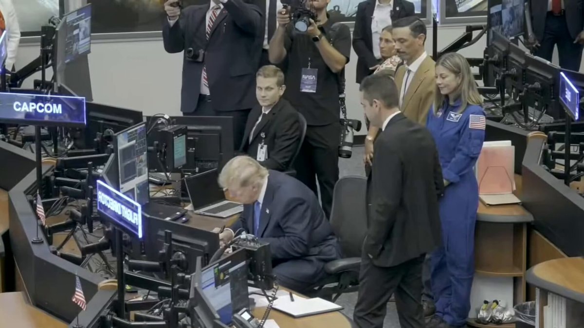 Trump signs Moon plaque