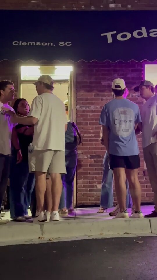 group outside building at night