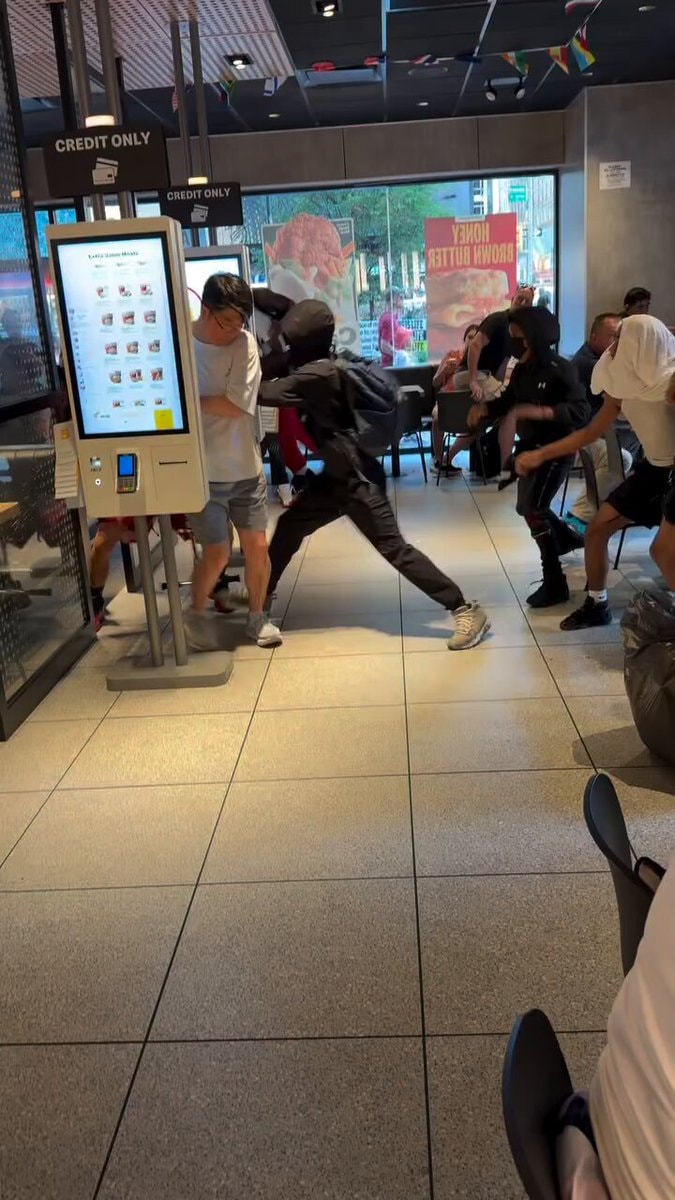 McDonald's brawl at self-order kiosk McDonald's brawl at self-order kiosk