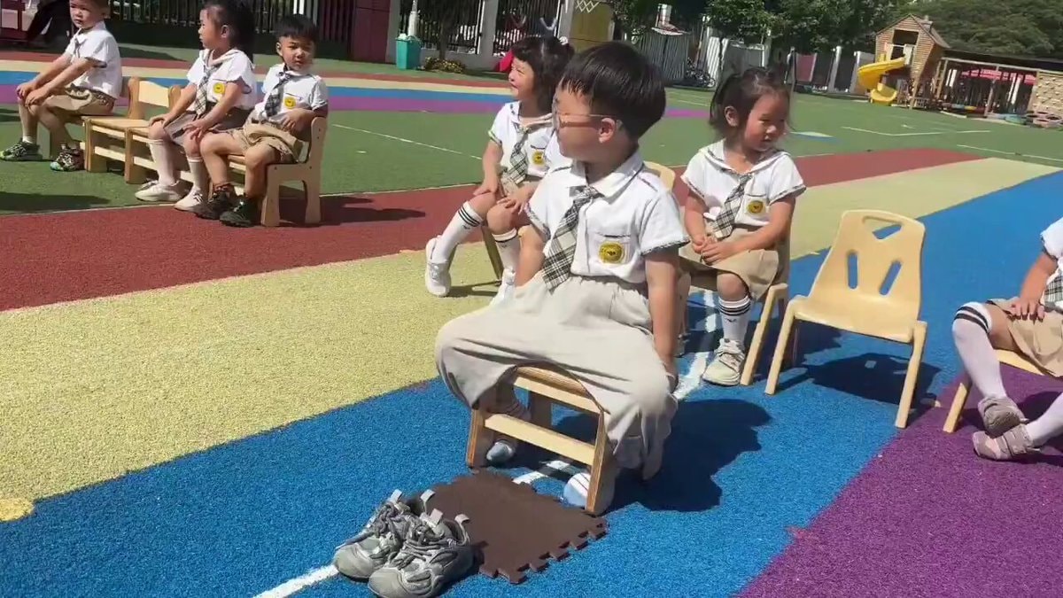 kids in uniforms moving strangely