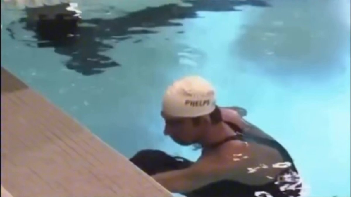 Shaq races Michael Phelps