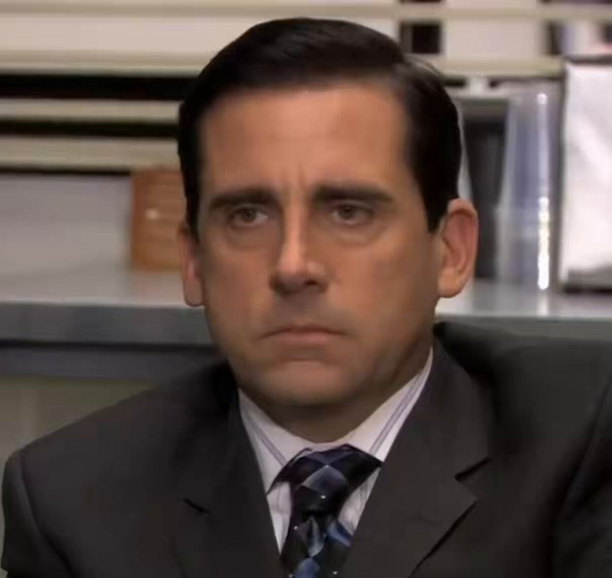 man in suit football season