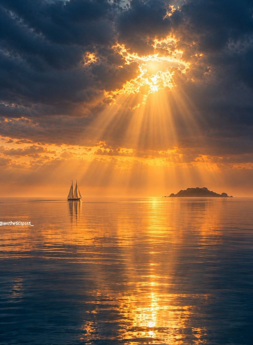 sailboat in golden ocean light