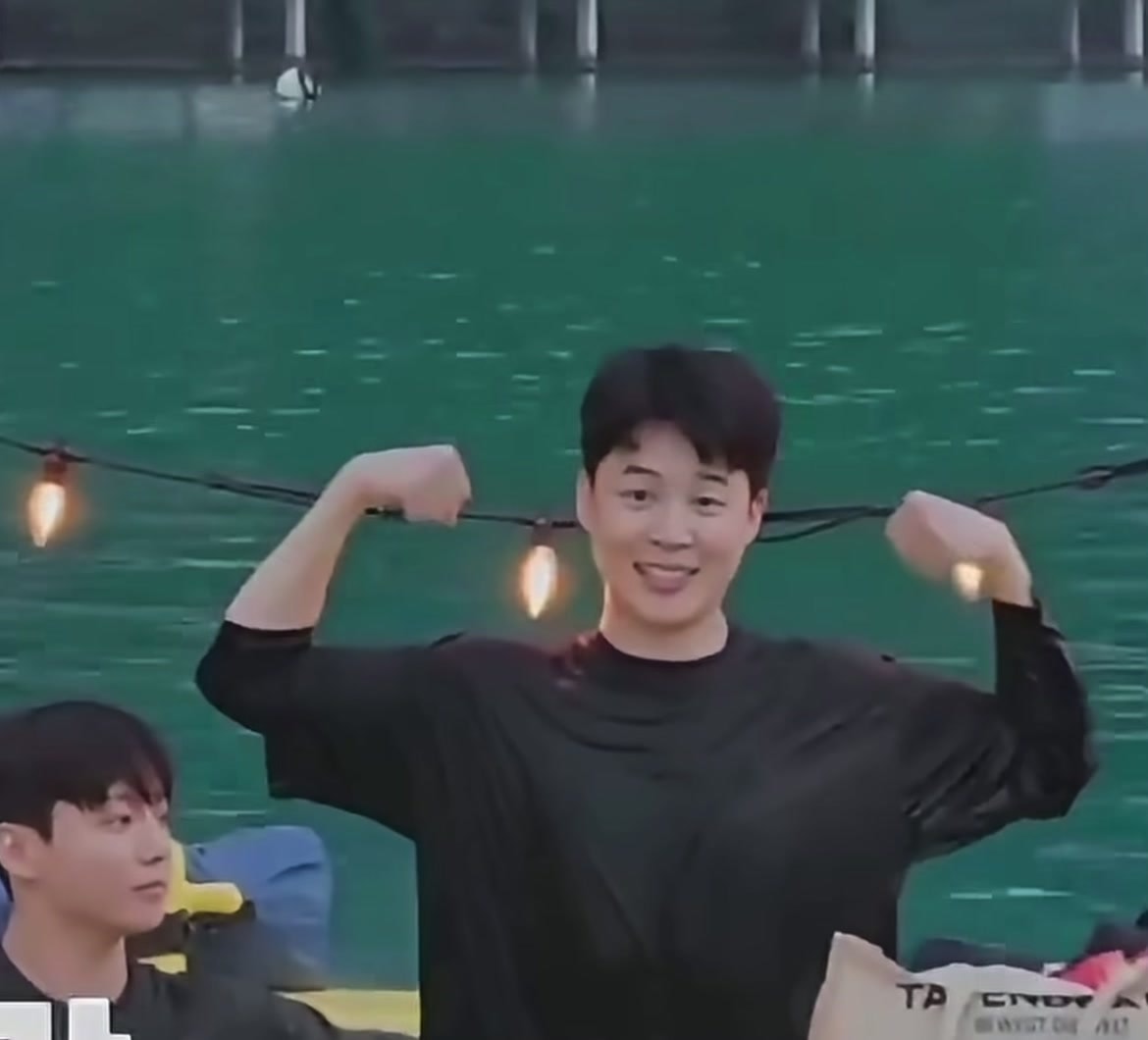 jimin flexing by the water