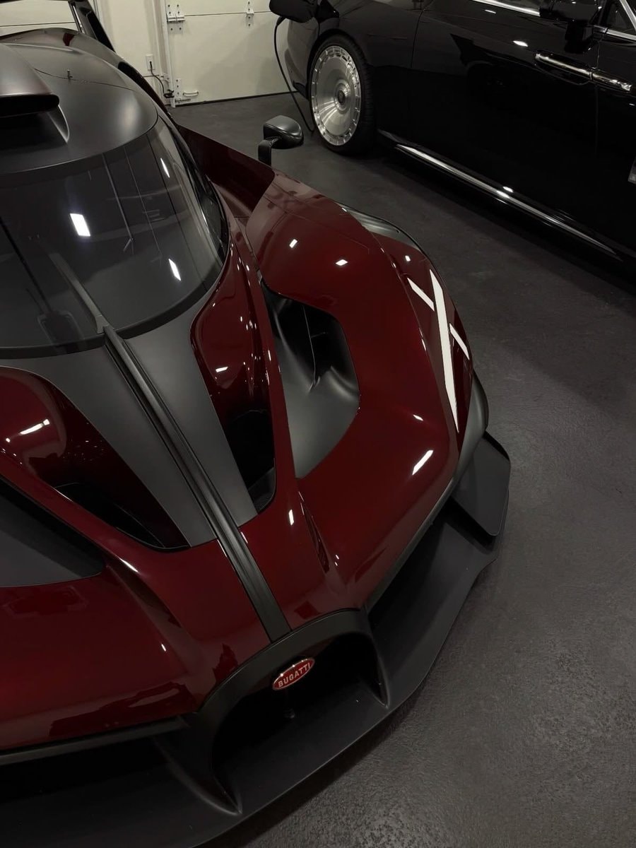 red Bugatti in garage (photo 1 of 4)
