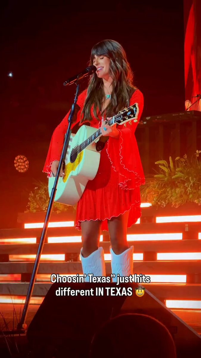 Singer radiant in red cowboy boots