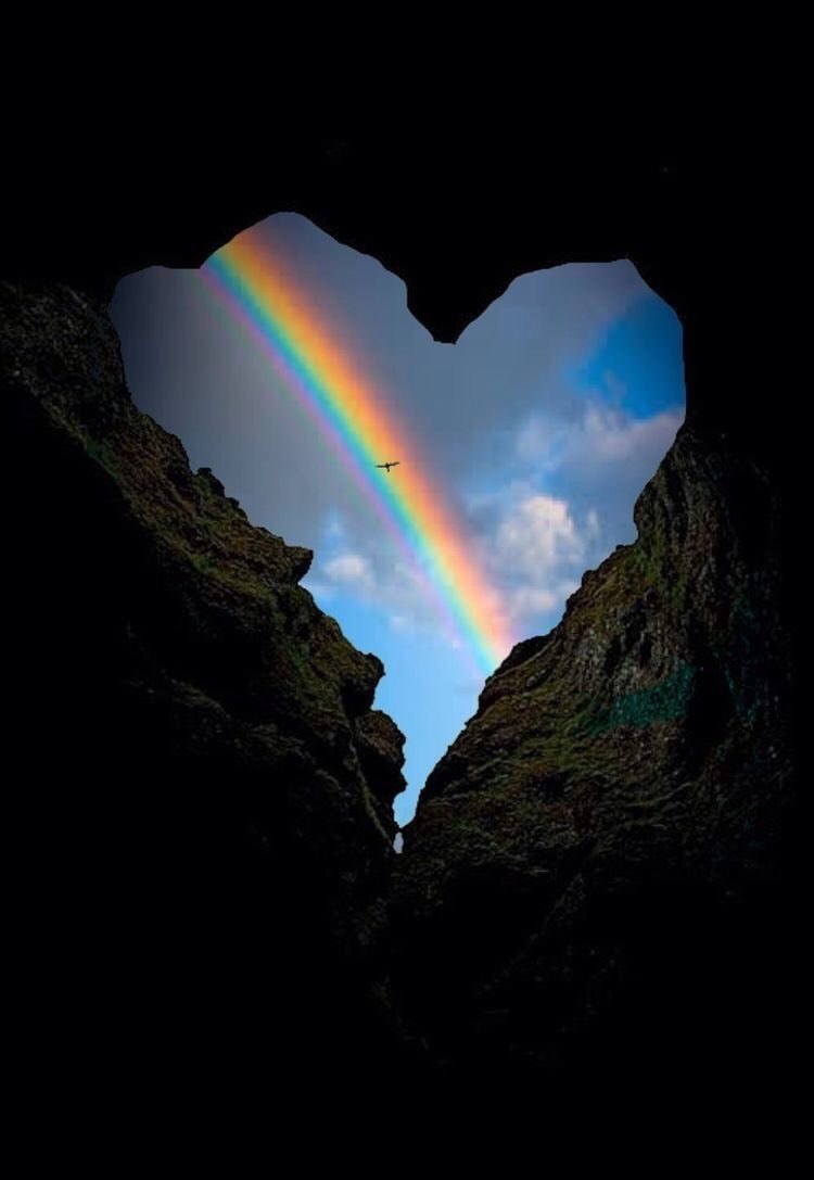 Heart shaped rock formation rainbow Heart shaped rock formation rainbow