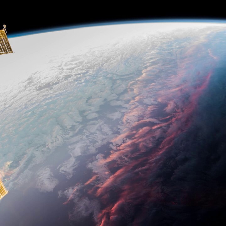 Space sunset Earth red clouds