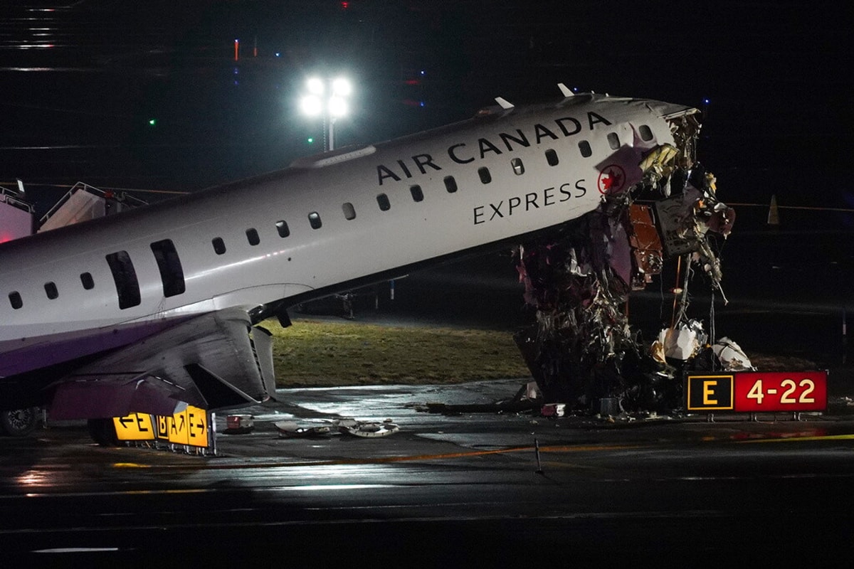 2 pilots killed, dozens injured after Air Canada jet collides with fire truck at LaGuardia Airport