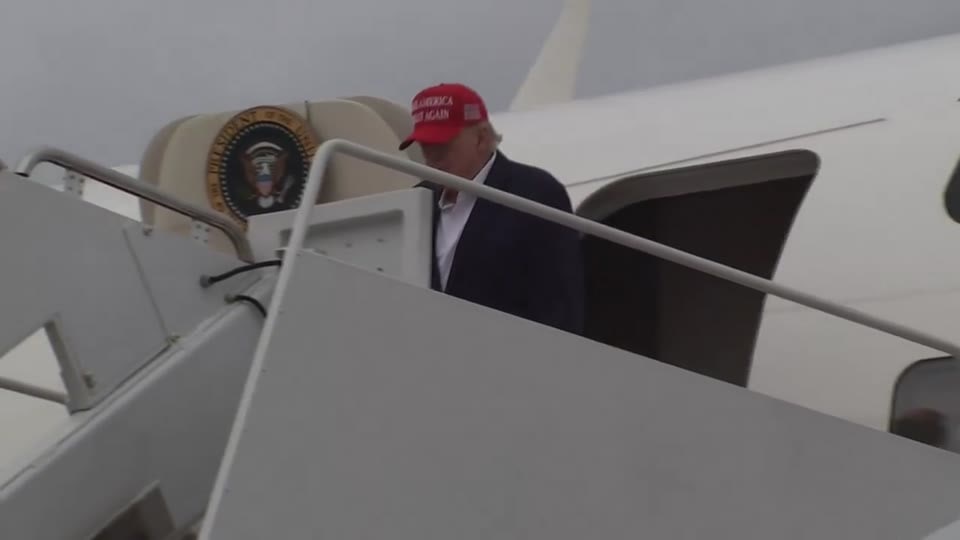 Trump steps off Air Force One